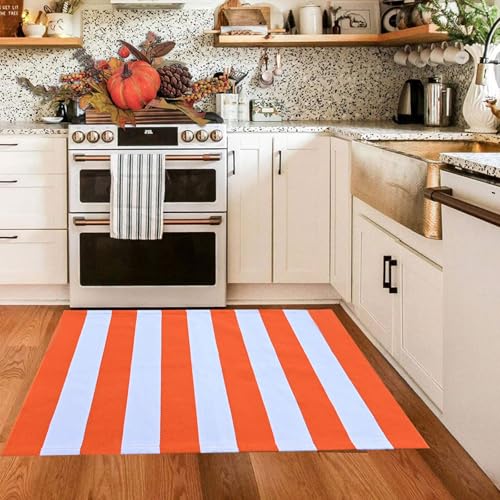 bright orange and white chunky striped rug