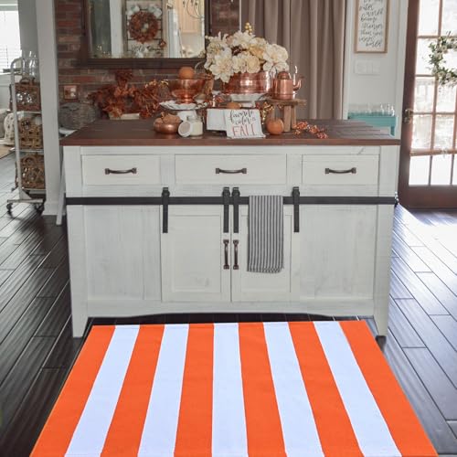 bright orange and white striped rug