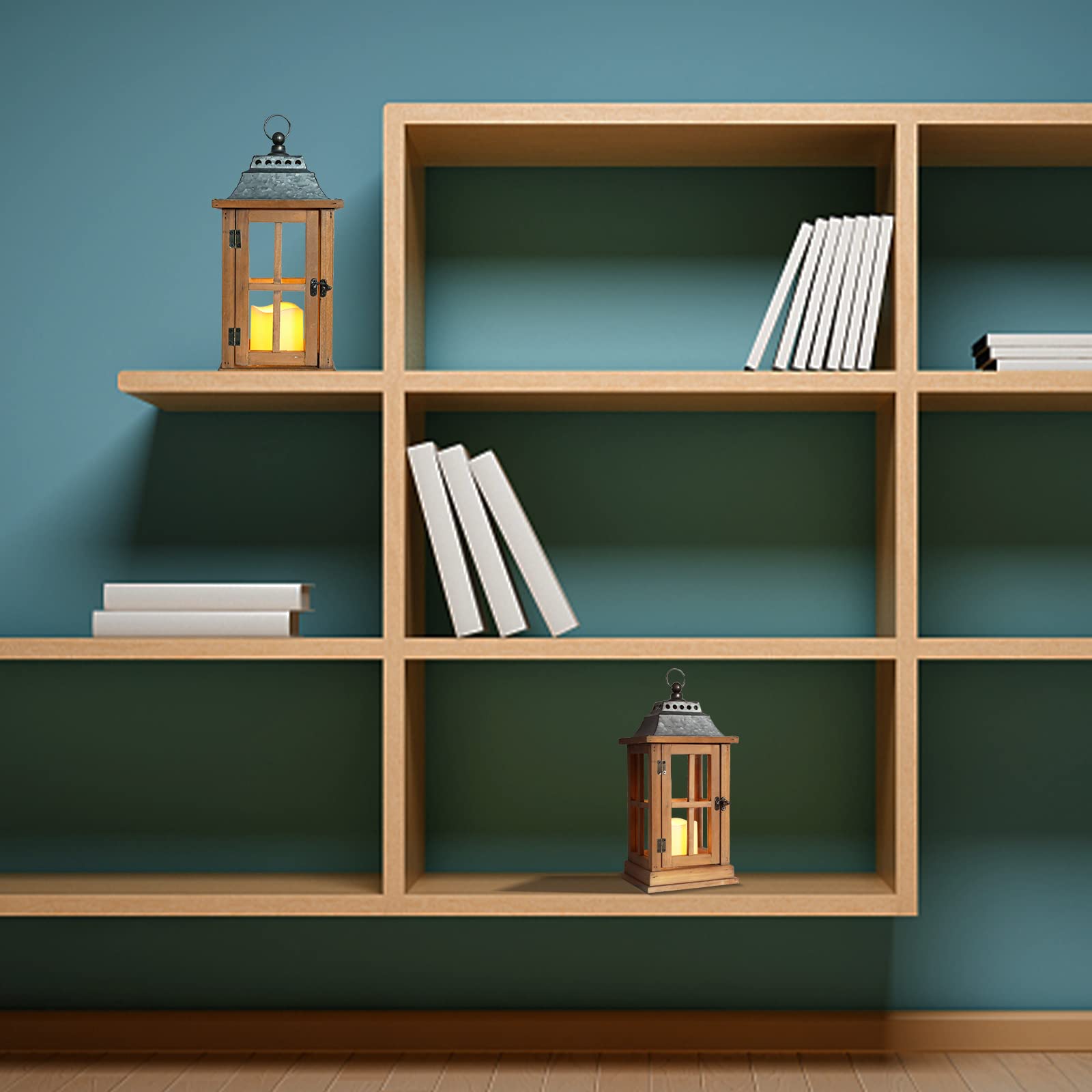 Wooden bookshelf with books and lanterns against a teal wall