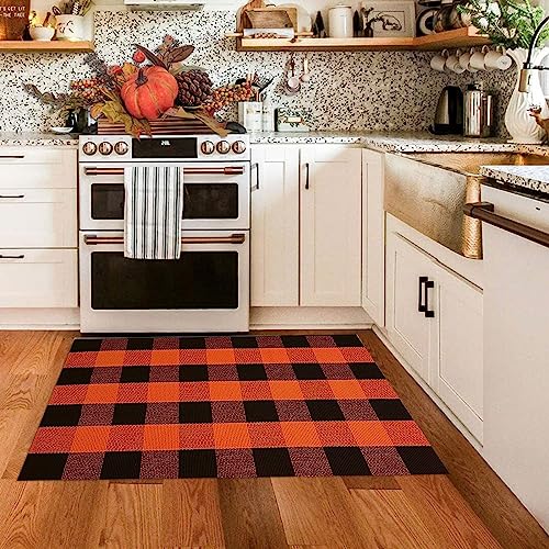 Orange and black buffalo plaid rug for indoor or outdoor decor