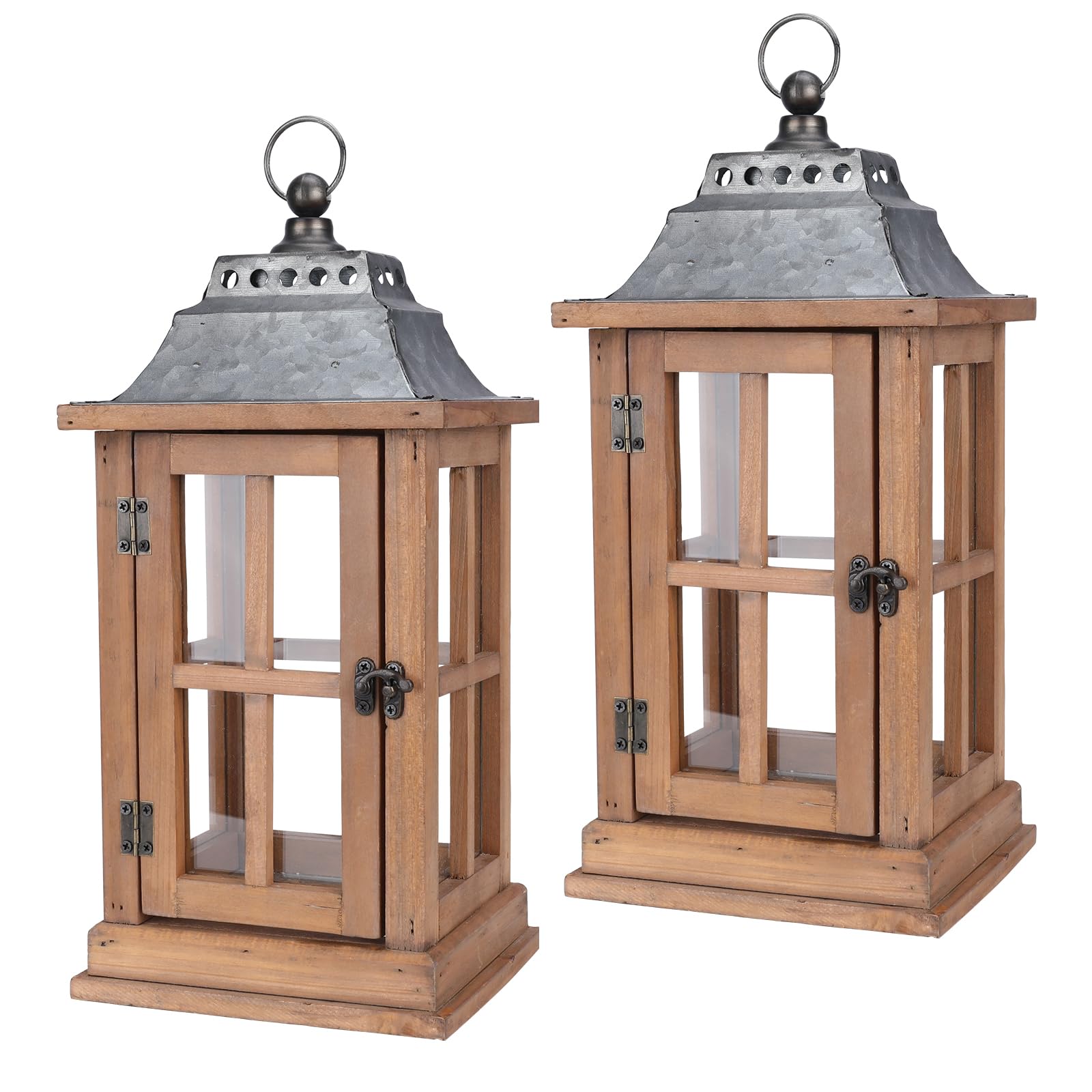 Two wooden lanterns with metal tops on a white background