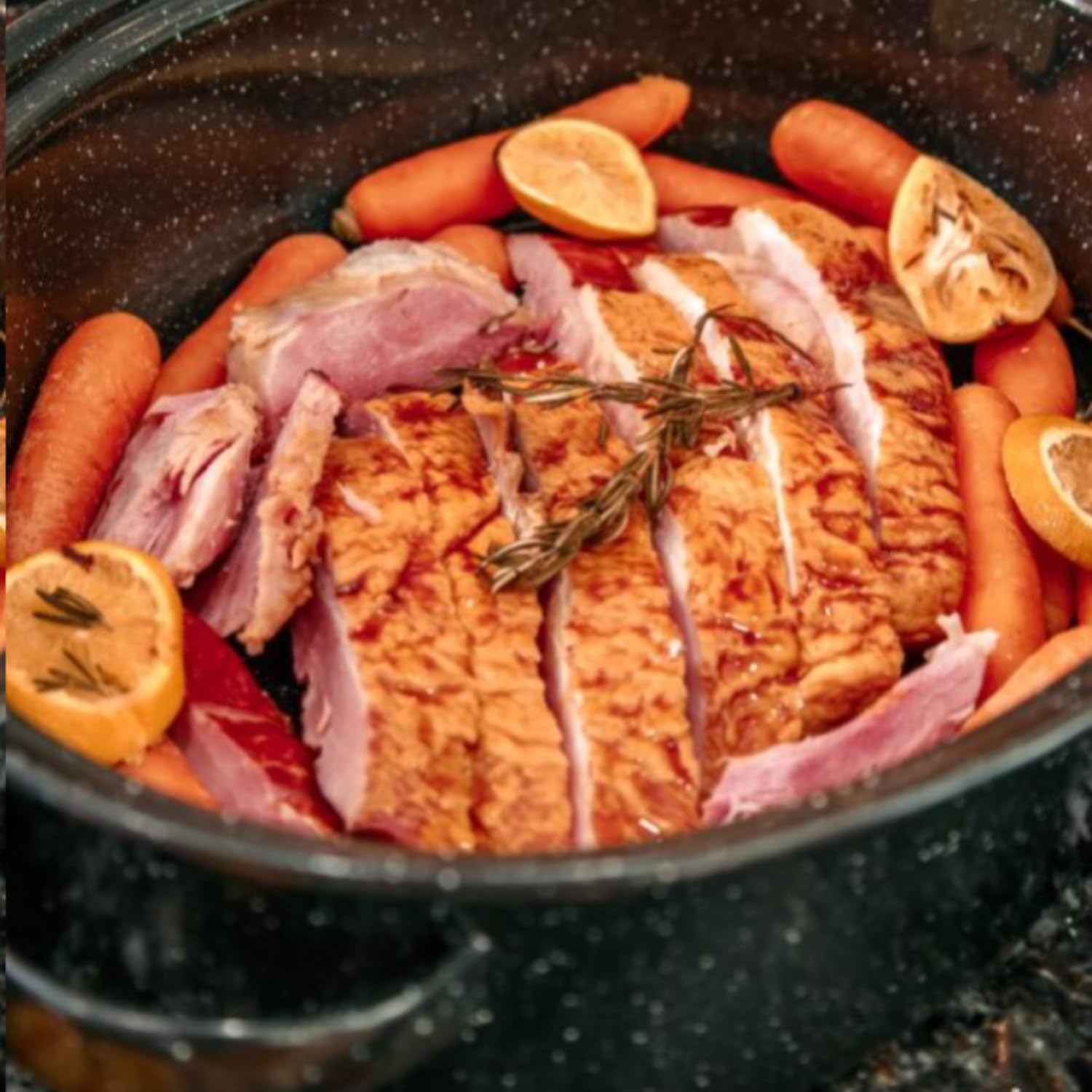 holiday ham in 19 inch black baking pan
