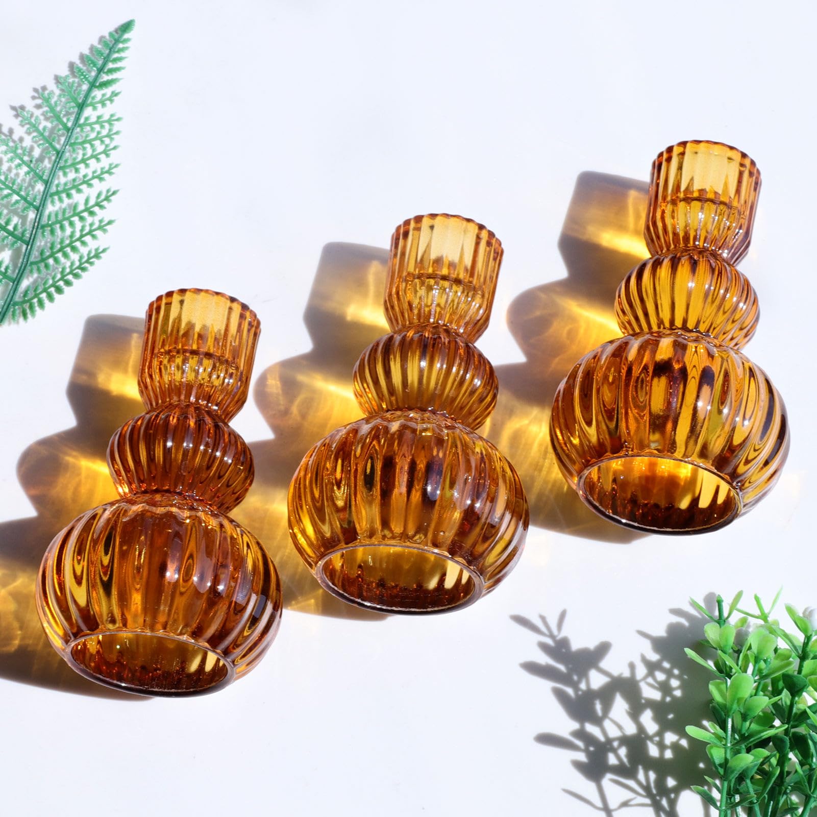 set of 3 ribbed glass amber candlestick holders