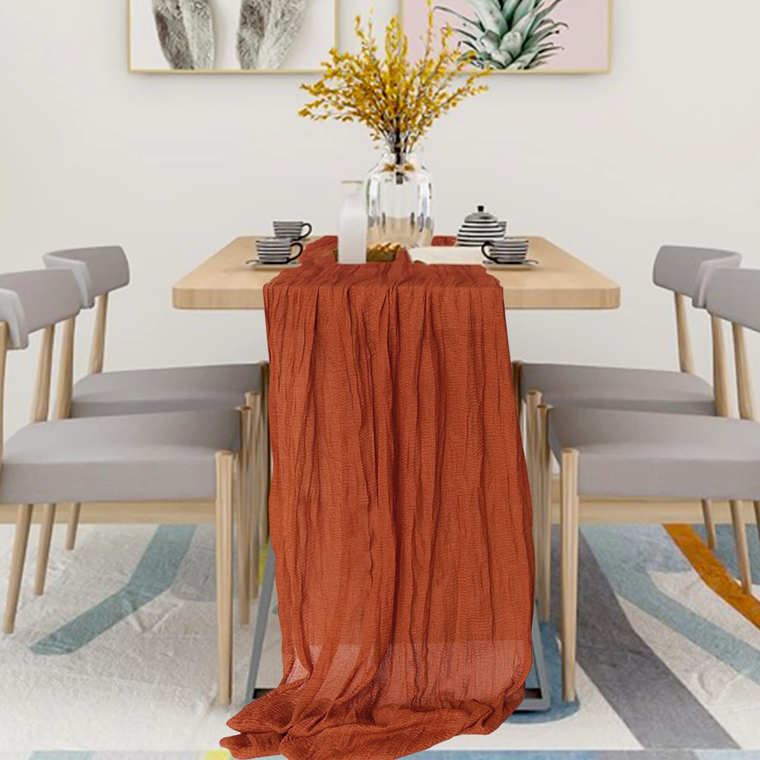 table setting with terracotta runner