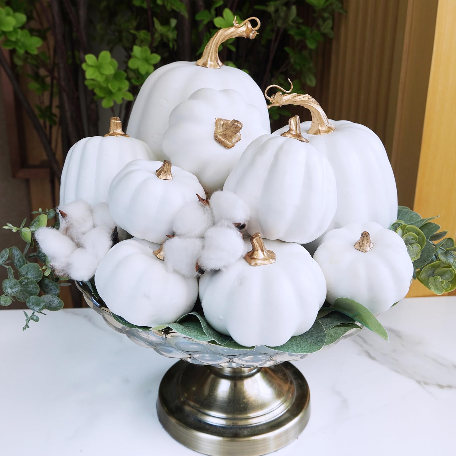 stacked white pumpkins centerpiece