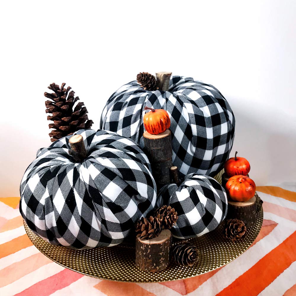 Halloween table centerpiece idea with black and white pumpkins