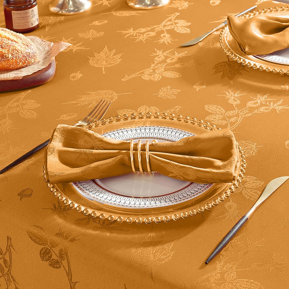 fall table setting ideas with matching fall tablecloth and napkins with leaf pattern
