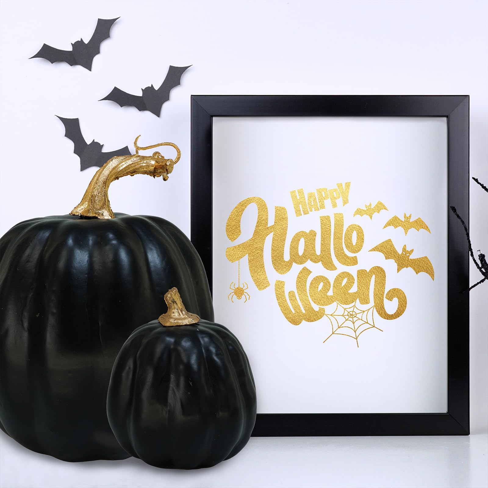 black faux pumpkin with gold stem Halloween decoration