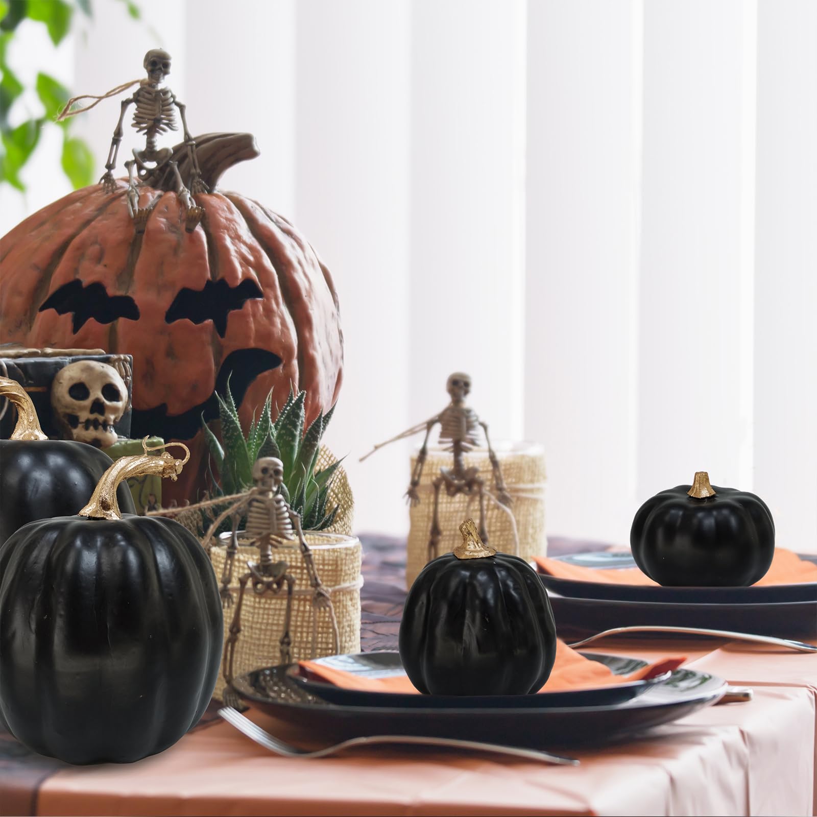 artificial black pumpkin decor in multiple sizes