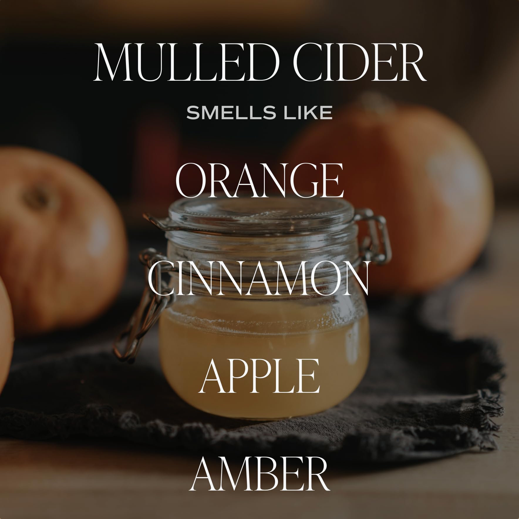mulled cider fall candle smells like orange, cinnamon, apple, amber