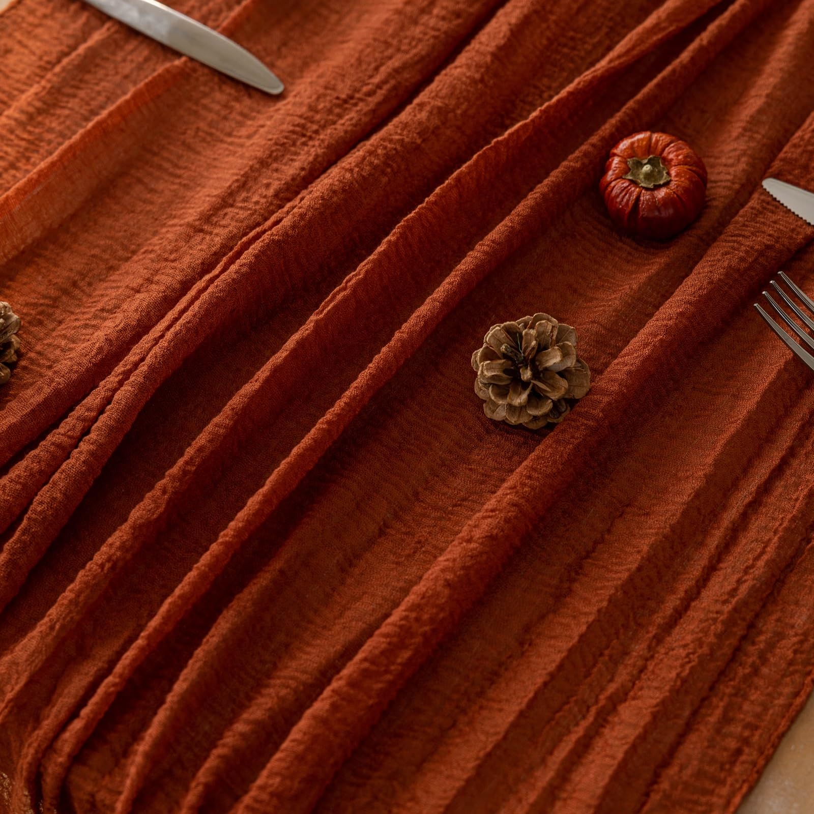 close-up view of orange table runner
