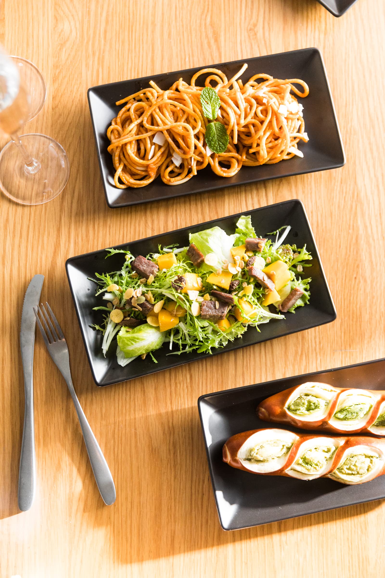 Set of 4 black porcelain serving platters