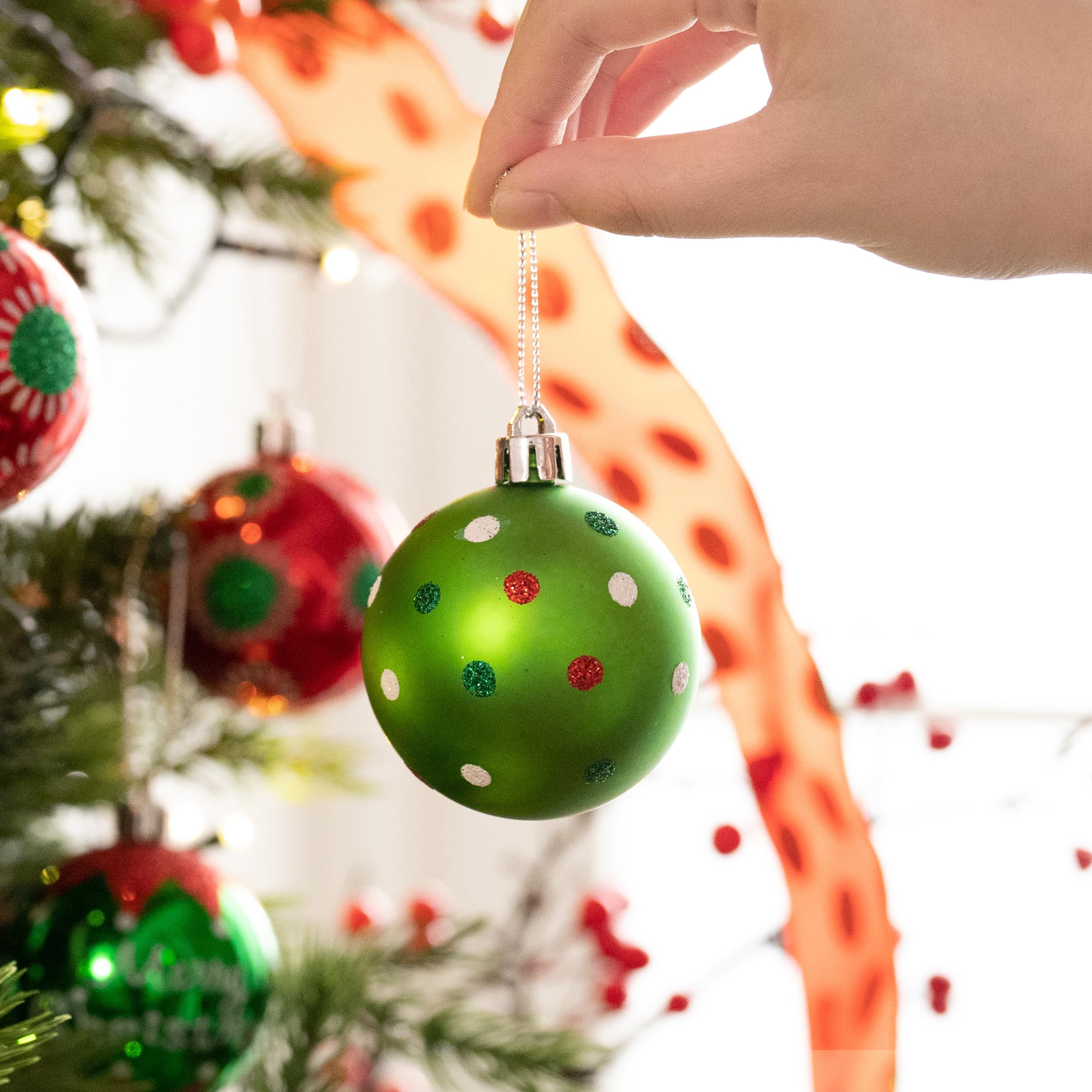 green with red and white polka dot ornaments