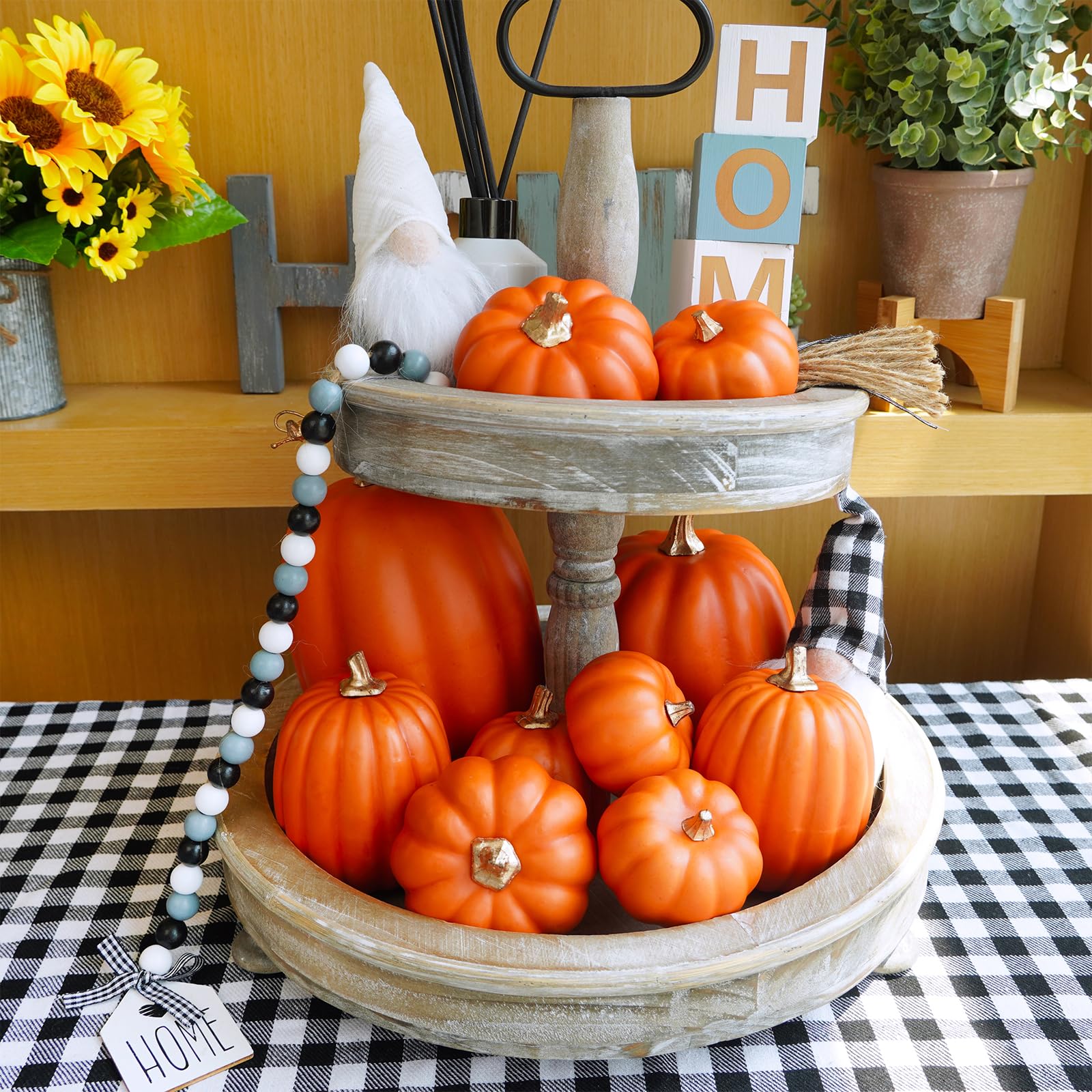 Orange artificial pumpkins table decor