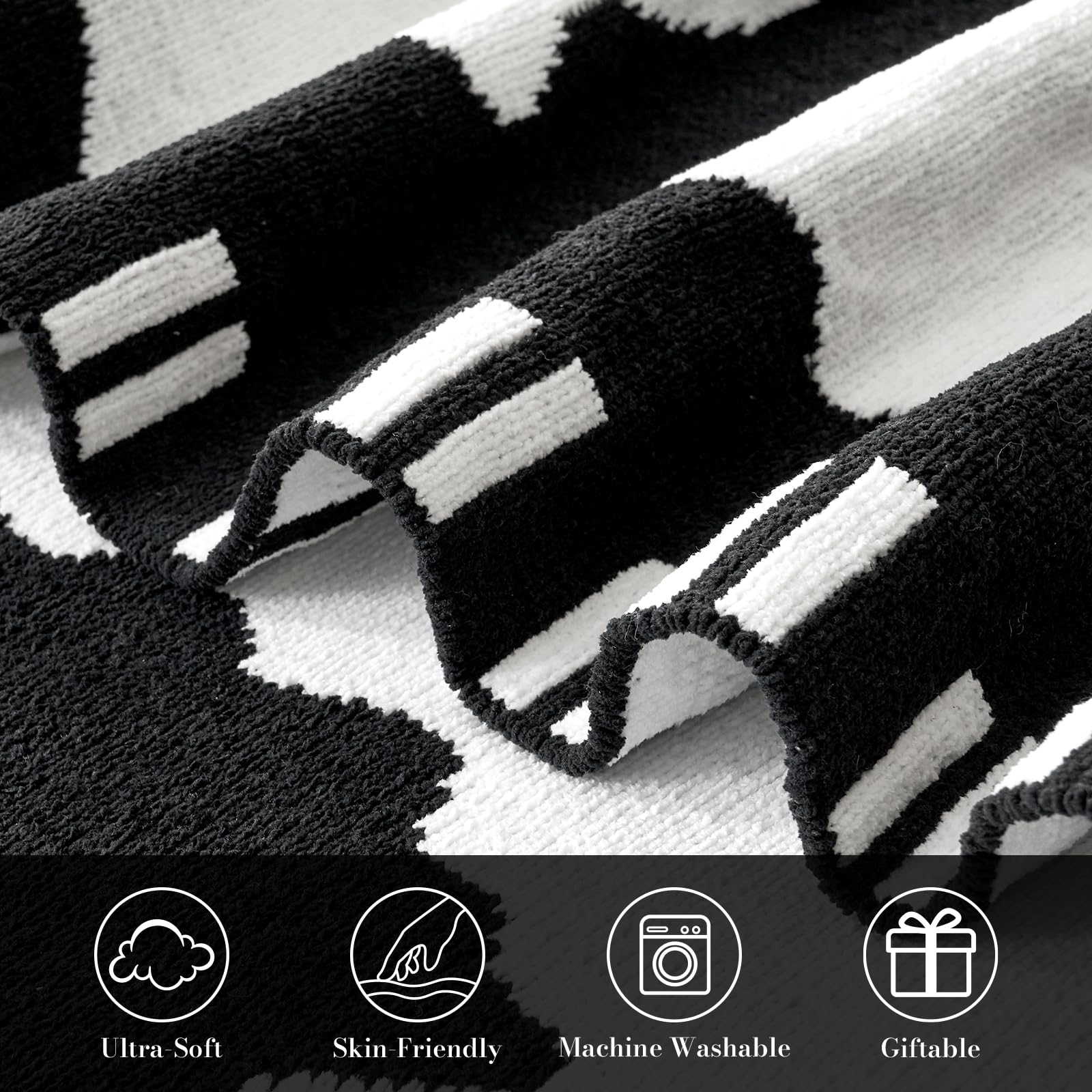 black and white ghost pattern Halloween blanket close up featuring ultra soft texture