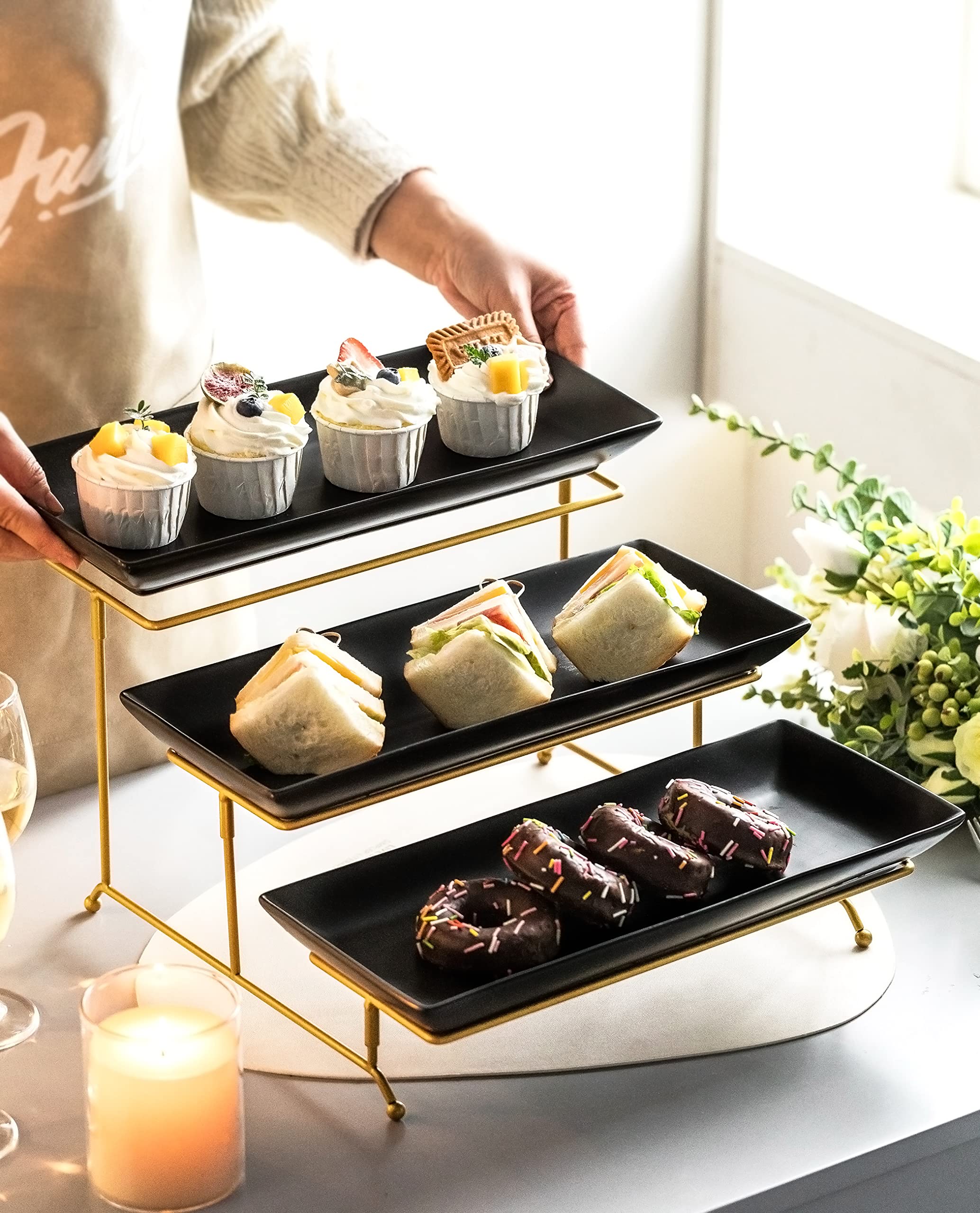 black and gold dessert tray party
