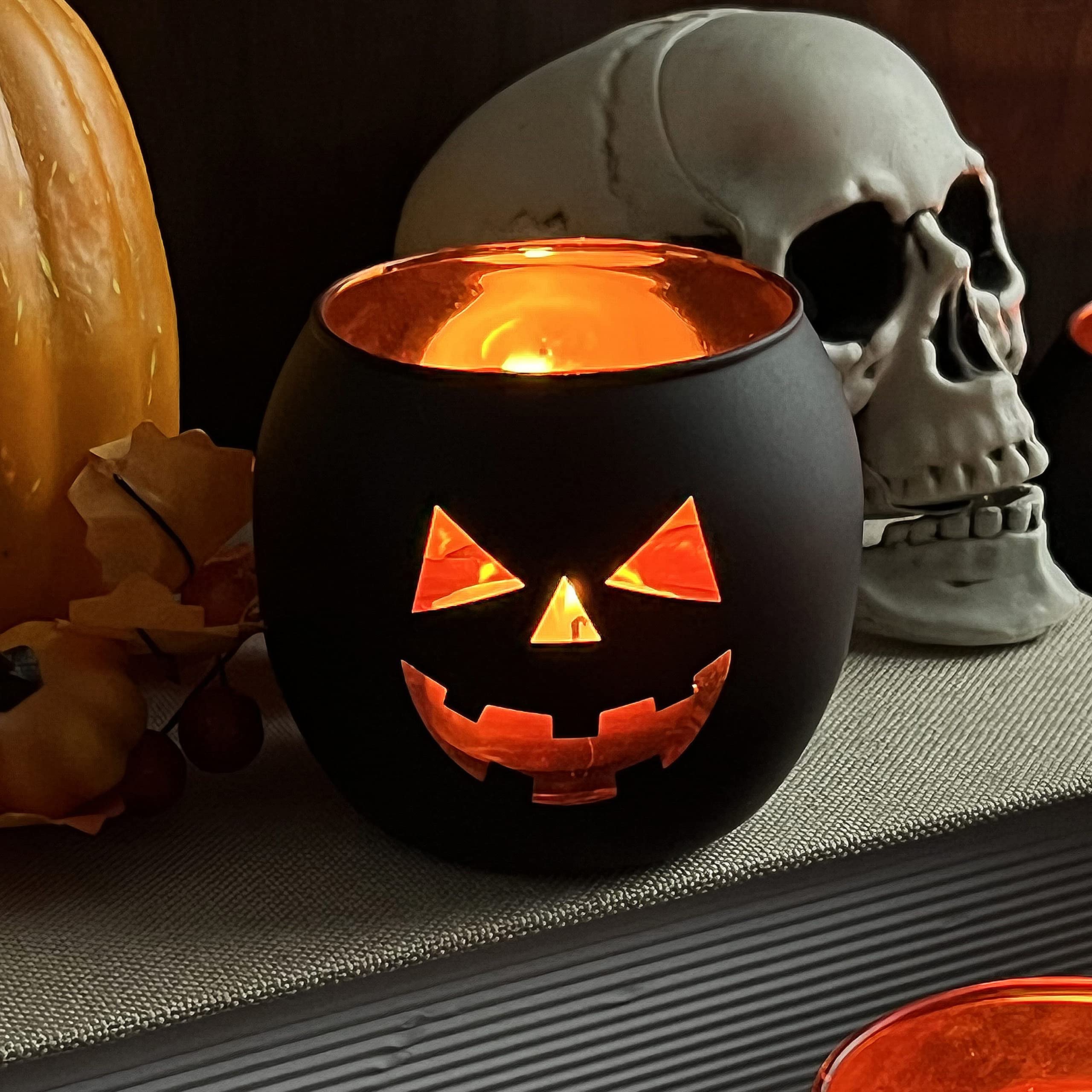 Halloween candle holder with pumpkin face