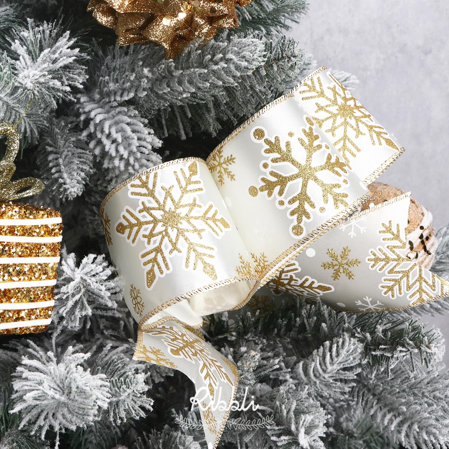 snowflake pattern white and gold ribbon