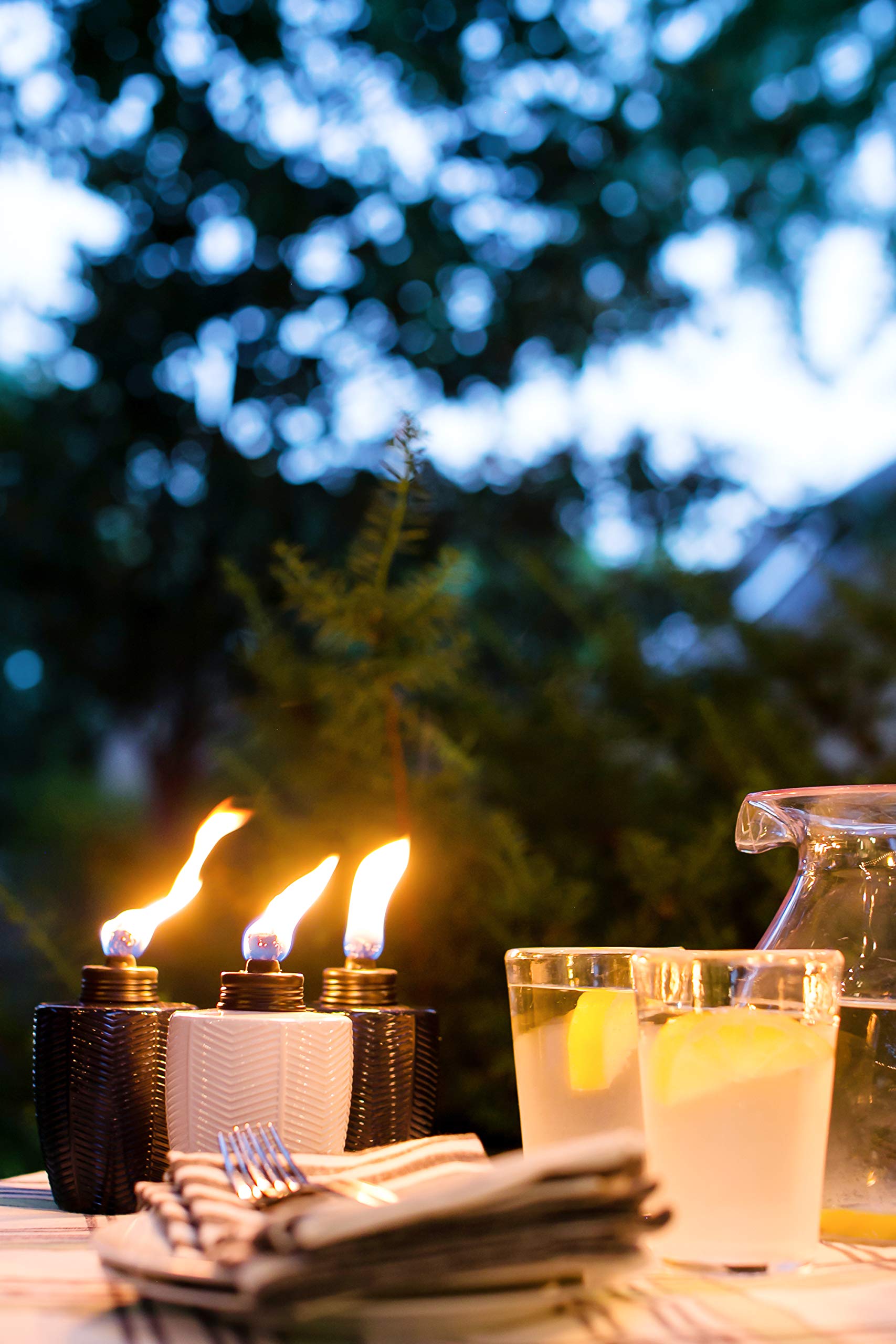 TIKI Brand Table Torch On Outdoor Table