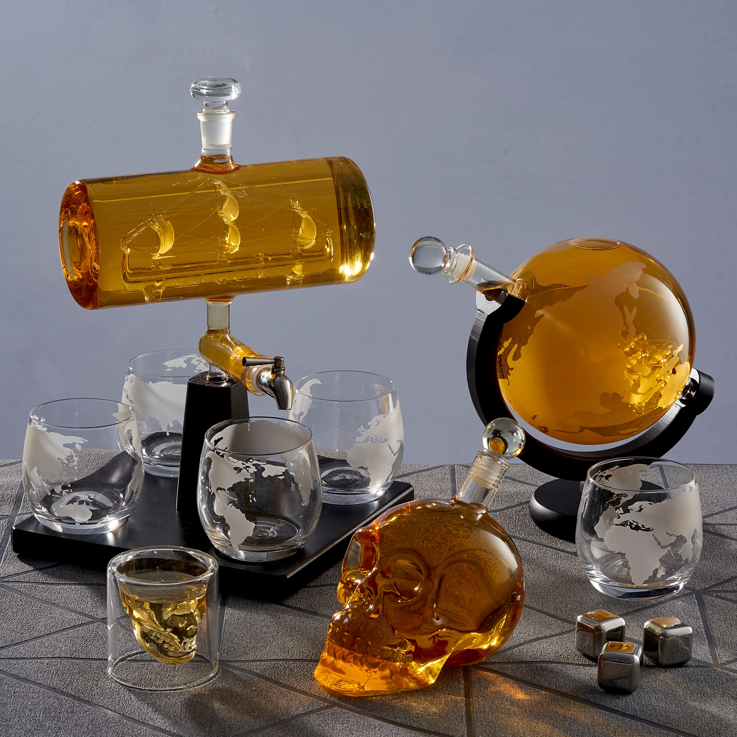skull-themed decanter and skull glasses