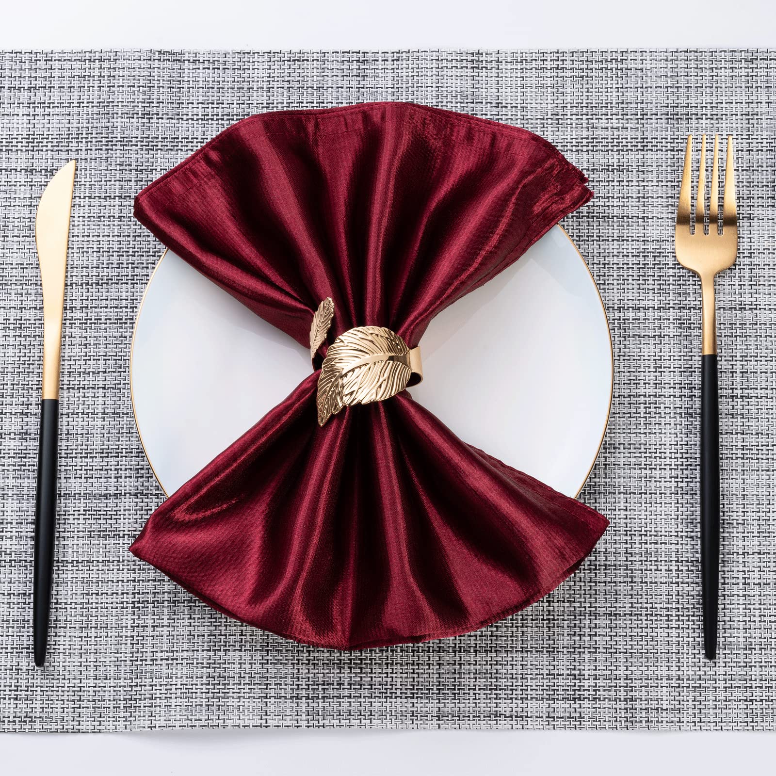 leaf napkin ring set in gold