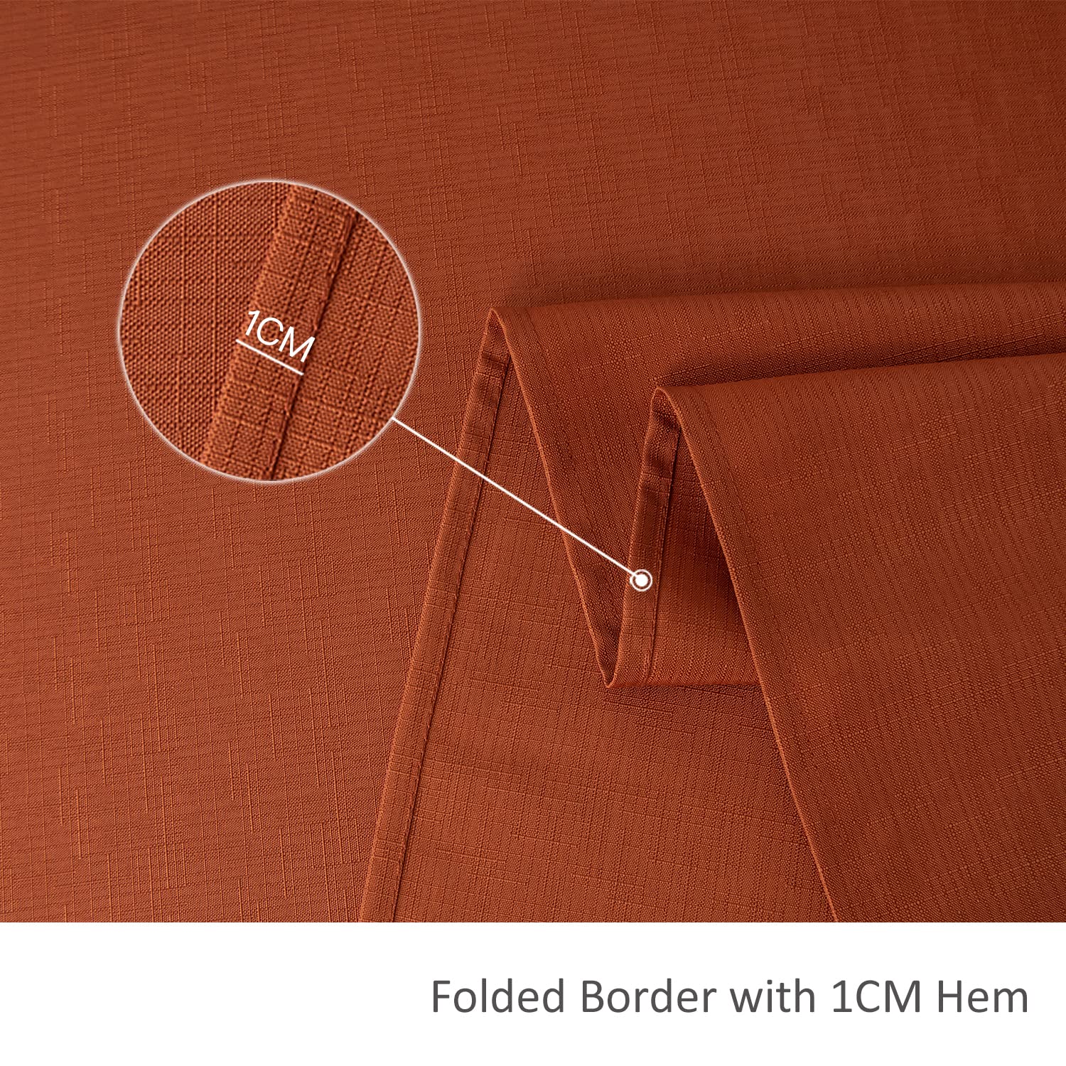 hemmed border on rust colored table cloth