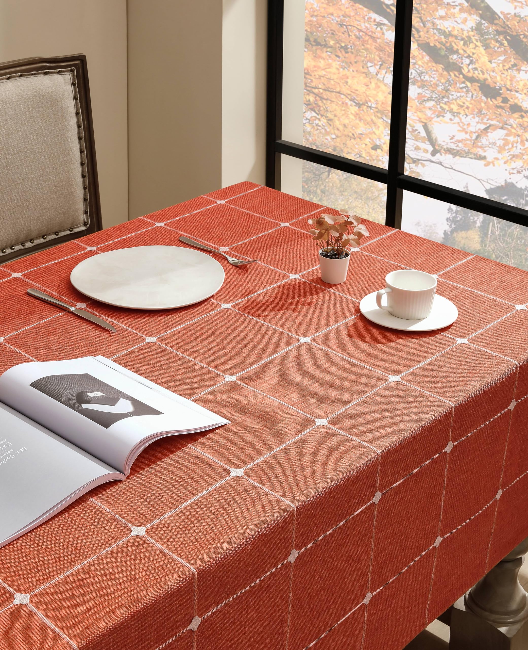 Orange embroidered farmhouse tablecloth with square pattern