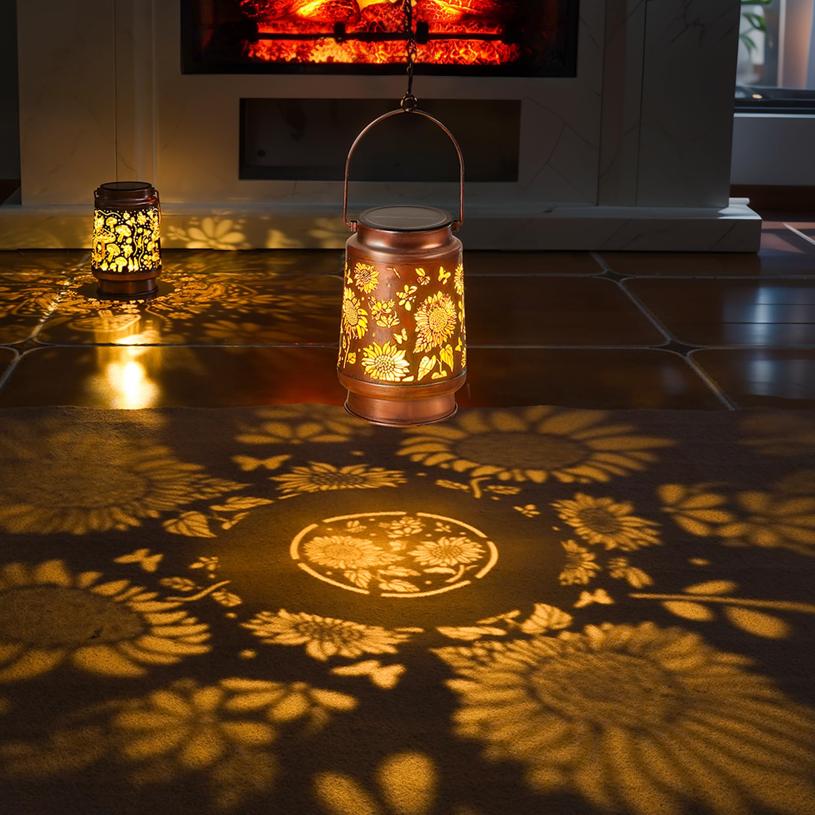 Decorative lantern casting floral sunflower shadows on a floor with a warm glow.