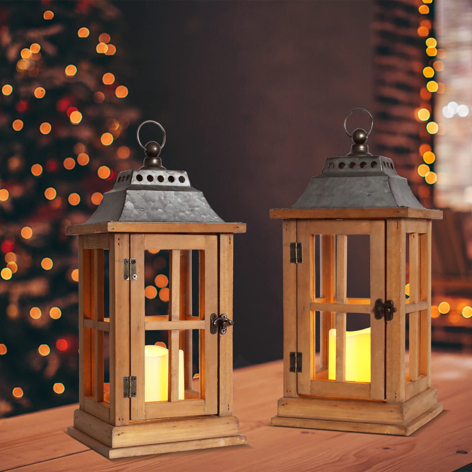 Two wooden lanterns with lit candles on a table against a festive background with blurred lights.