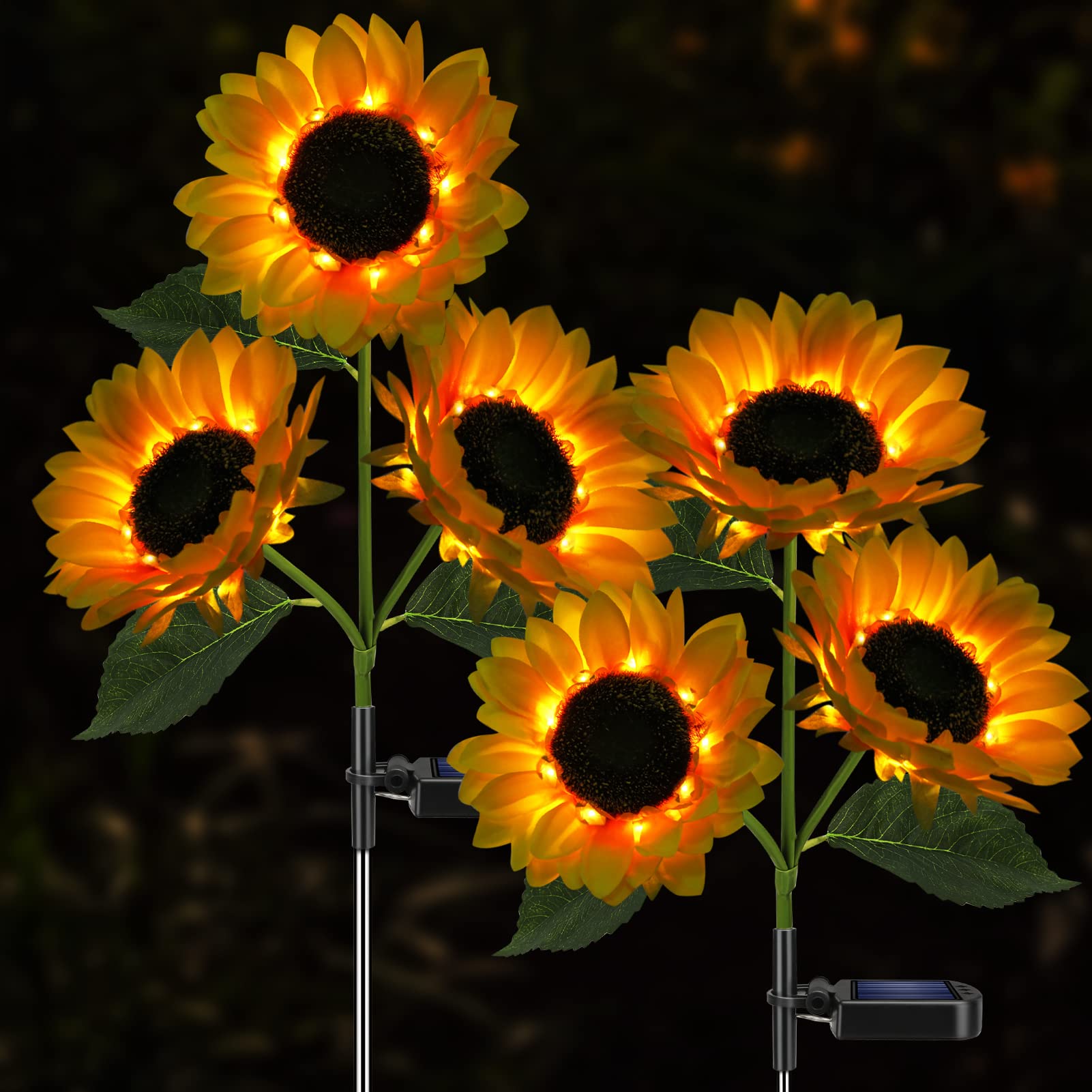 Solar-powered sunflower lights on a dark night