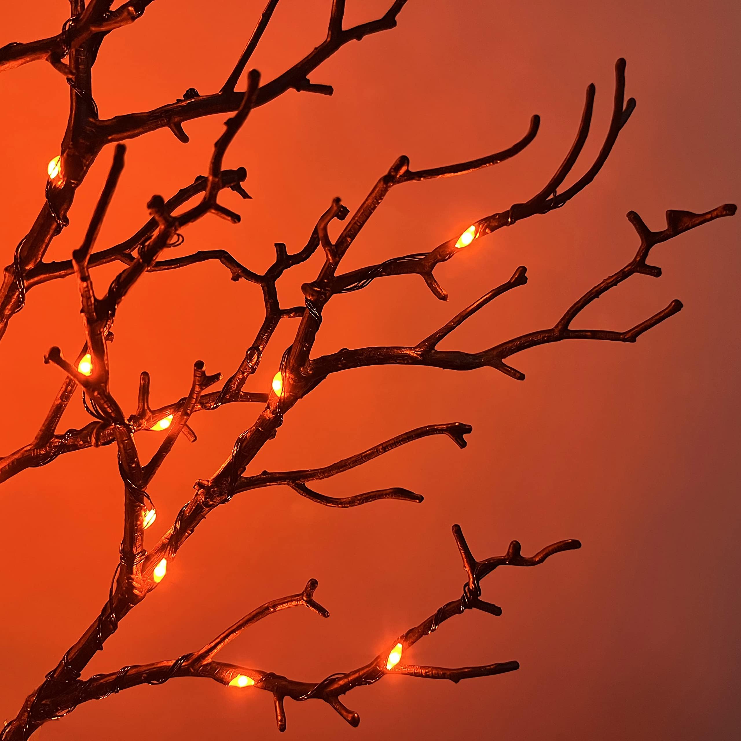 Halloween tree orange lights close up