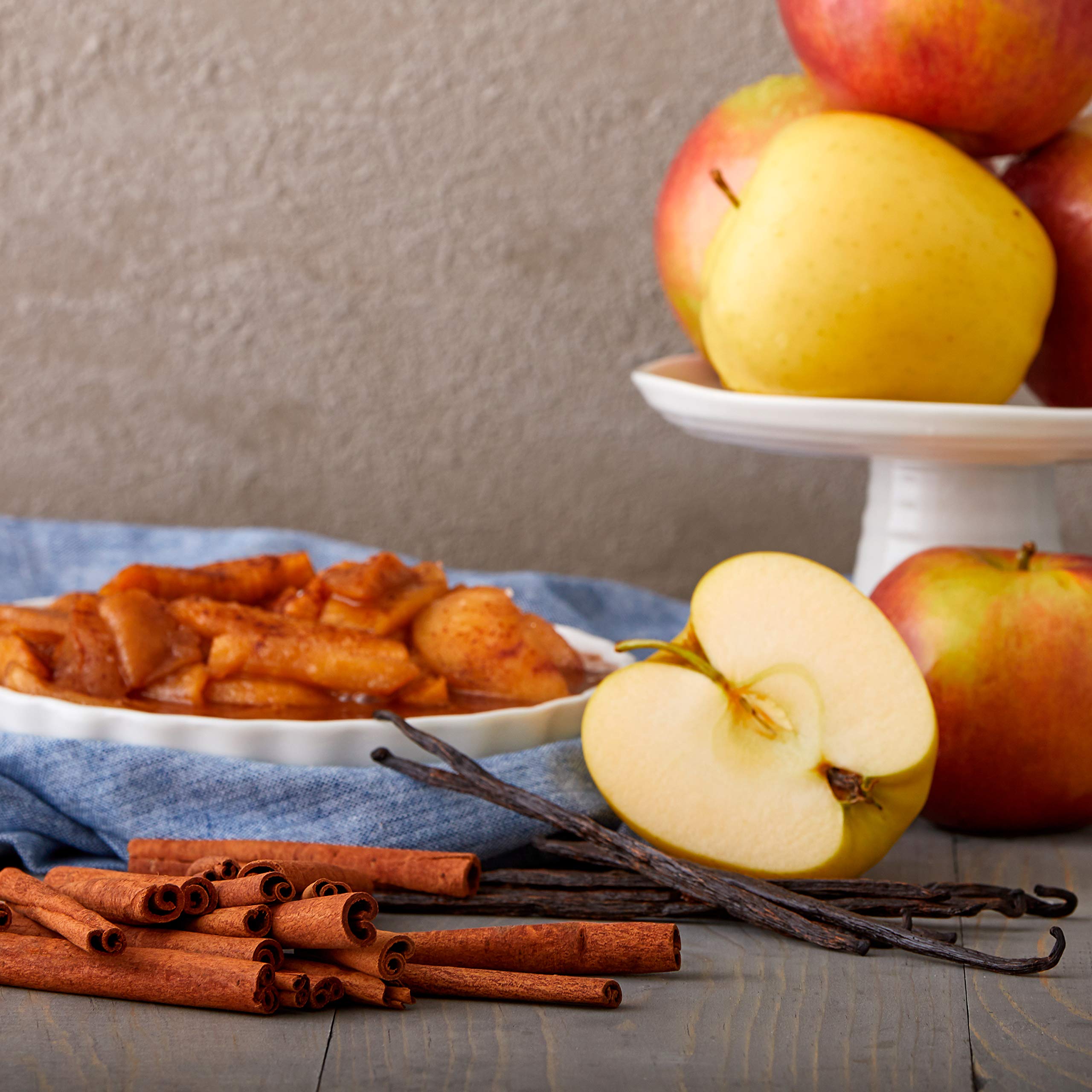 cinnamon sticks, vanilla, and sliced apples
